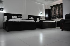 Letto o letti in una camera di Villa Hotel