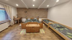 Posteľ alebo postele v izbe v ubytovaní Apartmán Anglický roh