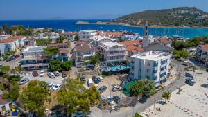 an aerial view of a city with a parking lot at Huzur Royal Hotel in Datca
