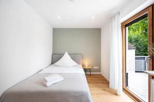Postel nebo postele na pokoji v ubytování Casa Tortuga - Ruhige 3 Zimmer Wohnung in Hüttenfeld