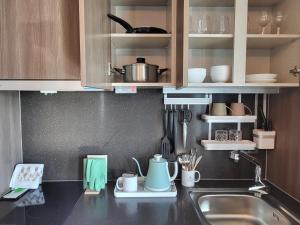 A kitchen or kitchenette at ELBON the stay Haeundae beach ocean view