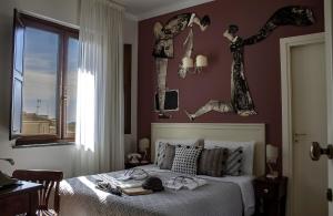 Voodi või voodid majutusasutuse Albergo Merùo toas