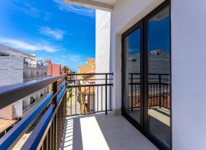 a balcony with a view of the city at DWO Nopal in Puerto de la Cruz
