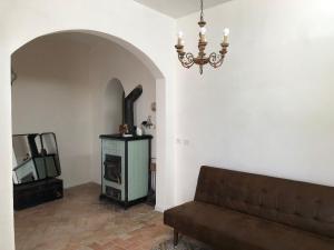 a living room with a couch and a fireplace at Casa Carmela in Ponza