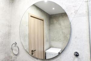 Koupelna v ubytování La Perla Apartments