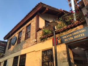 a street light in front of a building at grand friends in Antalya +9 photos