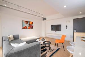 O zonă de relaxare la Laurel Hill Suites 1-Bed By YourHost UpperHill Nairobi