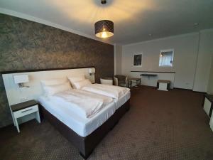 Posteľ alebo postele v izbe v ubytovaní artHOTEL Bremen + 70 fotografií