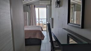 Postel nebo postele na pokoji v ubytování Retsina Apartments