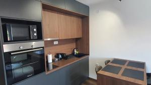 Kjøkken eller kjøkkenkrok på Apartments Spring