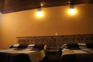 Letto o letti in una camera di Hotel Chapala Country
