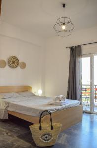 Postel nebo postele na pokoji v ubytování Boho Sea View Apartment