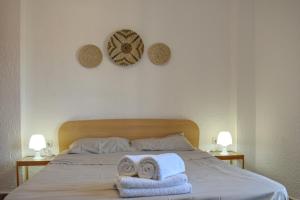 Postel nebo postele na pokoji v ubytování Boho Sea View Apartment