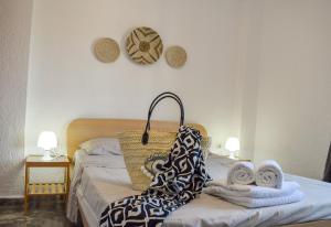 Postel nebo postele na pokoji v ubytování Boho Sea View Apartment