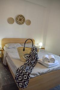 Postel nebo postele na pokoji v ubytování Boho Sea View Apartment