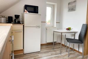 Kuchyň nebo kuchyňský kout v ubytování Nice Apartment in Zwickau