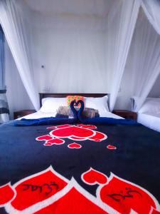 Postel nebo postele na pokoji v ubytování The Bliss Homestay