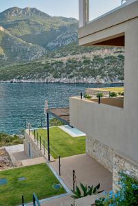 a view of the water from a house at Into The Blue Suites in Arkadiko Chorio