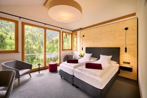 Postel nebo postele na pokoji v ubytování Hotel-Gasthof Mauthäusl + 37 fotografií