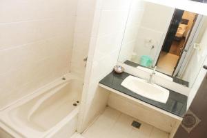 Ett badrum på Shelton Accommodator