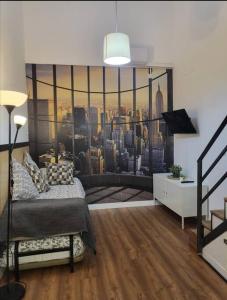 a bedroom with a large window of a city at Studio 4 Puerta Del Sol in Madrid
