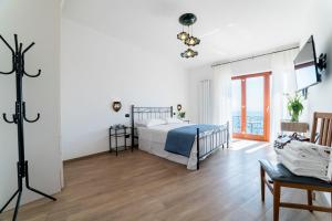 Łóżko lub łóżka w pokoju w obiekcie B&B Palazzo Pinto 2