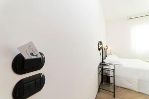 Łóżko lub łóżka w pokoju w obiekcie B&B Palazzo Pinto 2