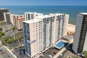 an aerial view of a large building near the ocean at Luxury Oceanfront Condo/Indoor pool/Massage chair in Ocean City