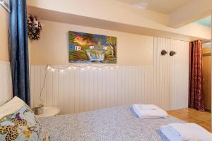 Postel nebo postele na pokoji v ubytování Soares Beach Apartment
