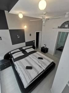 Ένα ή περισσότερα κρεβάτια σε δωμάτιο στο Apartman Marija