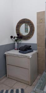 a dressing table with a mirror on top of it at Hanna's Place - Great Location in Eilat +17 photos