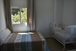 Krevet ili kreveti u jedinici u okviru objekta Lyas house Aguas Blancas urbanization