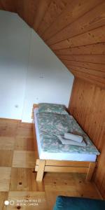 Postel nebo postele na pokoji v ubytování Holiday House Jezerka