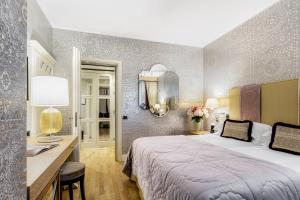 Łóżko lub łóżka w pokoju w obiekcie Splendid Venice - Starhotels Collezione