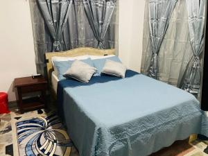 Postel nebo postele na pokoji v ubytování HOTEL IMPERIAL LA QUINTA