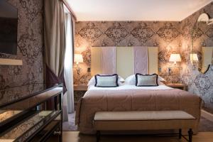 Łóżko lub łóżka w pokoju w obiekcie Splendid Venice - Starhotels Collezione