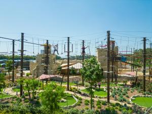 an amusement park with a roller coaster at City of Dreams Mediterranean - Integrated Resort, Casino & Entertainment in Limassol