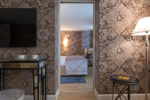 Telewizja i/lub zestaw kina domowego w obiekcie Splendid Venice - Starhotels Collezione