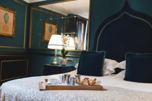 Łóżko lub łóżka w pokoju w obiekcie Splendid Venice - Starhotels Collezione
