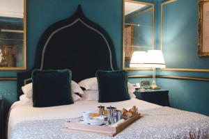 Łóżko lub łóżka w pokoju w obiekcie Splendid Venice - Starhotels Collezione