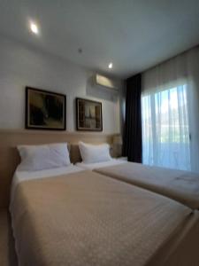 Postel nebo postele na pokoji v ubytování Hotel Relax Dhermi