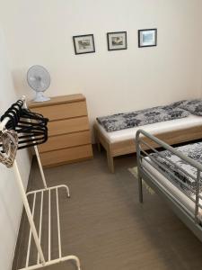 Postel nebo postele na pokoji v ubytování Apartmán Hustopeče
