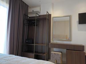Postel nebo postele na pokoji v ubytování Hotel Relax Dhermi