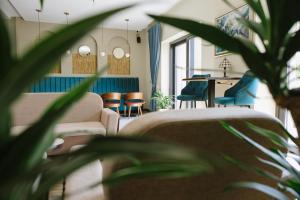 O zonă de relaxare la AVIOR Garni Hotel
