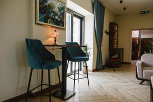 O zonă de relaxare la AVIOR Garni Hotel