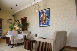 O zonă de relaxare la AVIOR Garni Hotel
