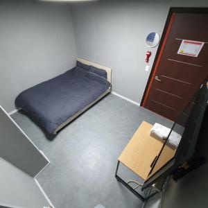 מיטה או מיטות בחדר ב-Seven Hostel