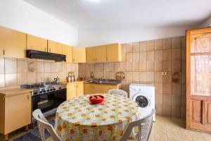 Kuchyň nebo kuchyňský kout v ubytování Casa Viola - a 100 metri dal mare