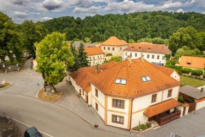 an overhead view of a large house with an orange roof at Penzion a kemp Koruna in Zlatá Koruna