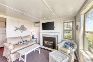 TV/trung tâm giải trí tại Castle Rock & Sea Belle Cottages